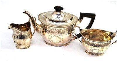 Lot 73 - Matched silver three piece tea service