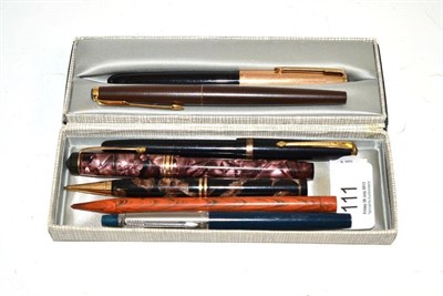 Lot 111 - Seven assorted pens and pencils