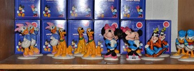 Lot 131 - Collection of thirteen Royal Doulton Mickey Mouse figures