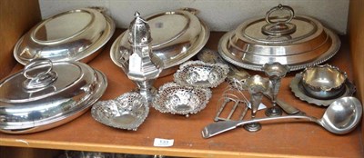 Lot 133 - Silver caster, three silver pierced dishes, silver toast rack, plated entree dishes, plated...