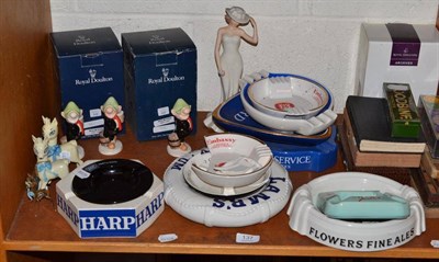 Lot 137 - Nine advertising ashtrays, three Babycham figures, four cribbage boards, three sets of...