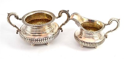 Lot 144 - A Victorian silver milk jug and sucrier, London 1845, Charles Lias