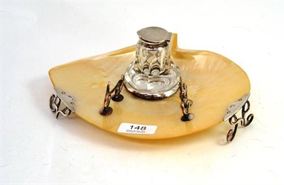 Lot 148 - A silver and shell ink stand with silver topped glass bottle