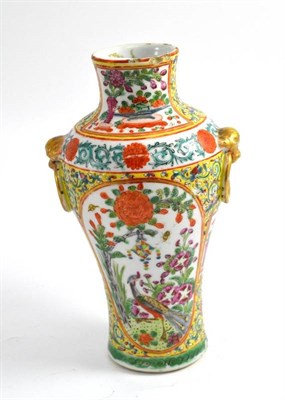 Lot 159 - A Chinese yellow ground vase decorated in enamels with birds and scrolling foliage