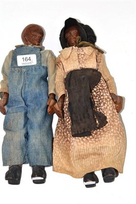 Lot 164 - Two American hand carved wood dressed dolls as farm workers *Blue Mountains, Kentucky bought by...