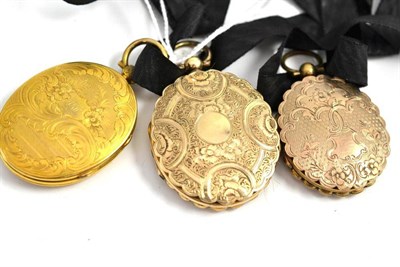 Lot 173 - Three twin entry lockets each with a portrait and hair inset inside