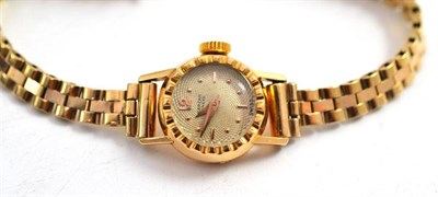 Lot 193 - A lady's gold coloured bracelet watch