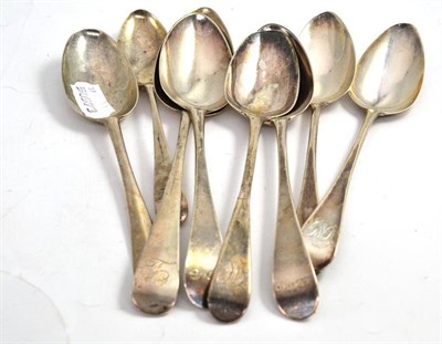 Lot 201 - Seven assorted Old English pattern silver spoons and a Hanoverian pattern spoon