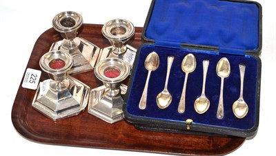 Lot 225 - Two cased sets of silver teaspoons and four dwarf candlesticks (a.f.)