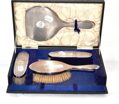 Lot 231 - A brush and mirror set, cased