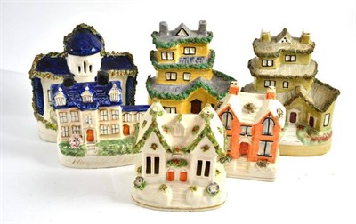 Lot 235 - Six assorted Staffordshire cottages etc