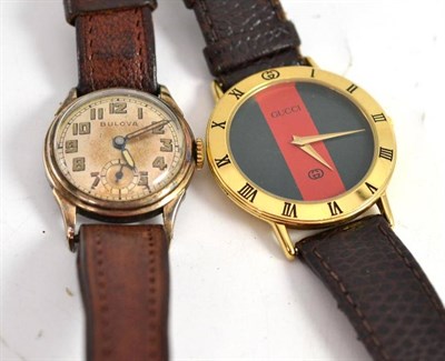 Lot 286 - A gold plated and steel Bulova wristwatch and a Gucci wristwatch (2)