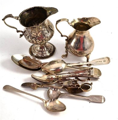 Lot 290 - Two silver milk jugs, mustard spoon, desert spoon, six teaspoons, two silver sugar tongs with...