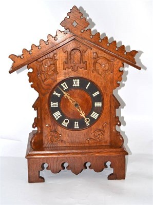 Lot 292 - A cuckoo table clock