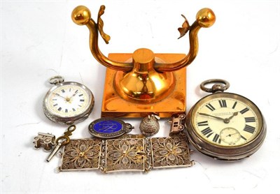 Lot 301 - Silver pocket watch, silver fob watch, silver bracelet, three charms, pocket watch stand and a...