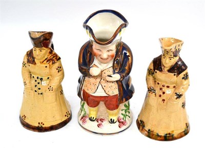 Lot 308 - A pair of French earthenware Toby jugs and an Allertons Snuff Taker Toby jug