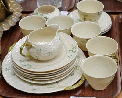 Lot 314 - A Belleek clover pattern part tea service