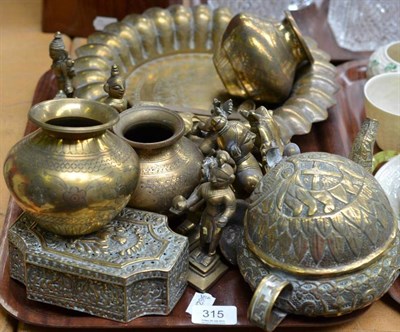 Lot 315 - Quantity of Eastern brassware to include scalloped shaped dish, tea pot, three engraved vases,...