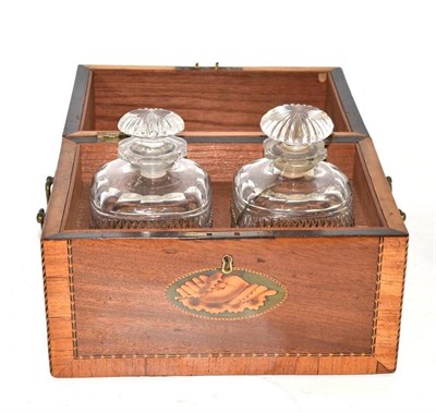 Lot 331 - A George III mahogany decanter box, opening to reveal two square spirit decanters and stoppers