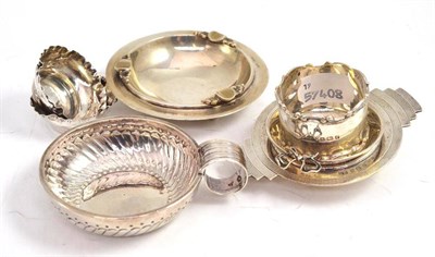 Lot 364 - A silver ashtray, strainer, two salts, napkin ring and two wine tasters