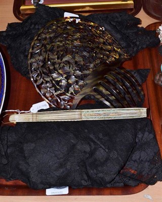 Lot 393 - Hair comb, two black lace shawls and pierced and painted fan with paper mount