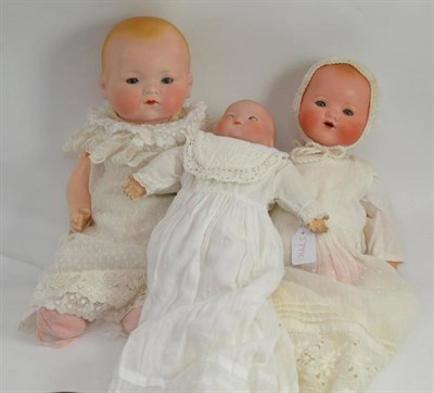 Lot 399 - Armand Marseille 341 bisque socket head baby doll and two others (3)