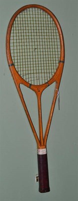 Lot 431 - A Hazell's Streamline Patented tennis racket, with blue star, supplied by The Asbestos and...