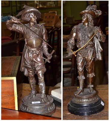 Lot 433 - A late 19th century French spelter figure of a musketeer, titled DONCESAR, and another similar,...