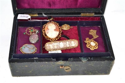 Lot 446 - A jewellery box and contents including a bar cameo brooch carved with flowers, a cameo brooch,...