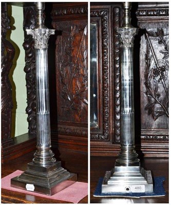 Lot 480 - A pair of silver plated Corinthian column table lamps