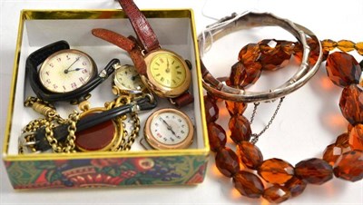 Lot 5 - Three assorted wristwatches, a fob watch, a swivel seal fob, a pinchbeck chain, glass beads and two