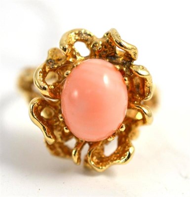 Lot 10 - A coral ring, stamped '14K'