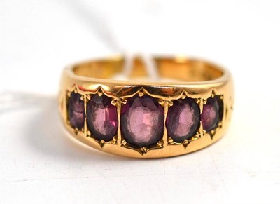 Lot 20 - A garnet five stone ring (one chipped stone and others scuffed), hallmark worn - Chester