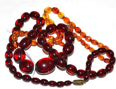 Lot 26 - A cherry amber bead necklace and a faceted bead necklace