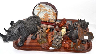 Lot 50 - A collection of Oriental bronze and boxwood figures, ebony rhinoceros, two carved cork groups,...