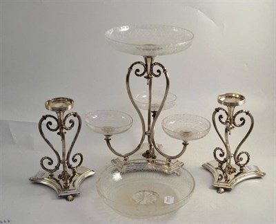 Lot 61 - A set of three silver plated table centrepieces with etched glass dishes