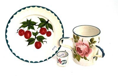 Lot 72 - A Wemyss ware rose painted tyg, a cherry painted plate and a miniature mug