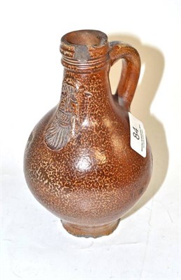 Lot 84 - A 17th century saltglaze Bellarmine jug