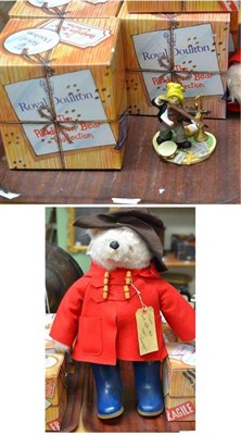 Lot 91 - Eight Royal Doulton Paddington Bear figures, PB1-8 (all boxed) and a stuffed Paddington Bear