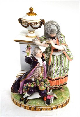 Lot 99 - A 19th century porcelain figure of a lady and a gent beside a column, bears a Meissen Marcolini...