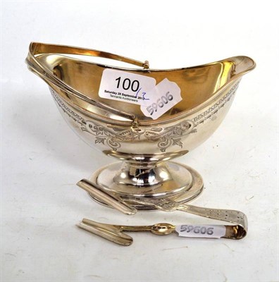 Lot 100 - A silver sugar basket and a pair of tongs