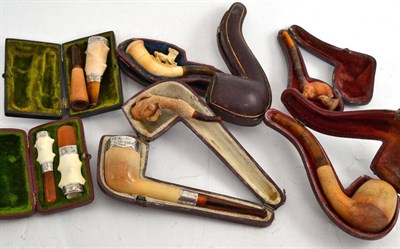 Lot 115 - Two Meerschaum pipes, three Meerschaum cheroot holders and two pairs of Meerschaum cigar...