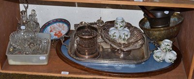 Lot 121 - A collection of Victorian lustre drops and parts, silver plated cruet stand, egg stand, twin...