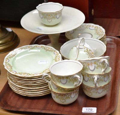 Lot 179 - Doulton tea set, twelve plates, eight saucers, seven cups, bowl, jug and a cake stand