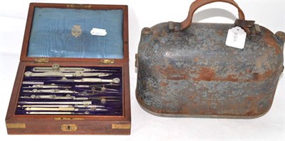 Lot 192 - A cased drawing set and a cased sight/level