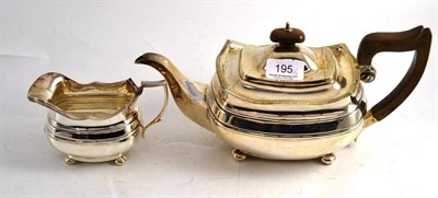 Lot 195 - A silver two piece tea service