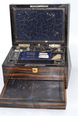 Lot 197 - A Victorian coromandel travelling toilet box