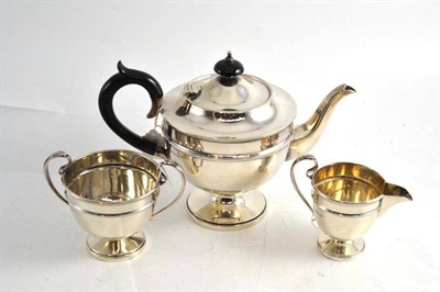 Lot 199 - A three piece silver composite tea set