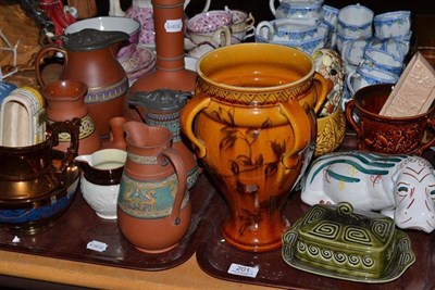 Lot 201 - A Linthorpe pottery oil lamp base, shape 652, with four lug handles, painted with flowers,...