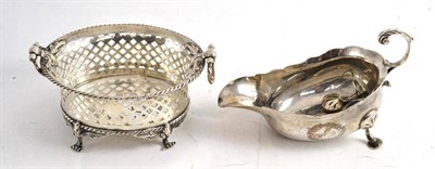 Lot 225 - A Newcastle silver sauce boat, foot detached but present and a Chester silver dish with pierced...